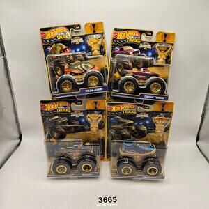 HOT WHEELS MONSTER TRUCKS TROPHY CHAMPIONS GOLD SERIES LOT OF 4 BIG FOOT SNEAKER